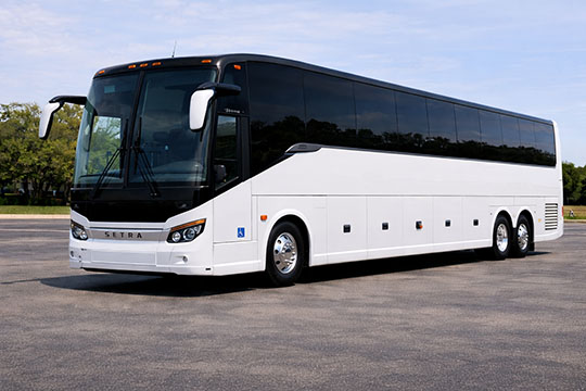 56-passenger charter bus rental Manhattan TX